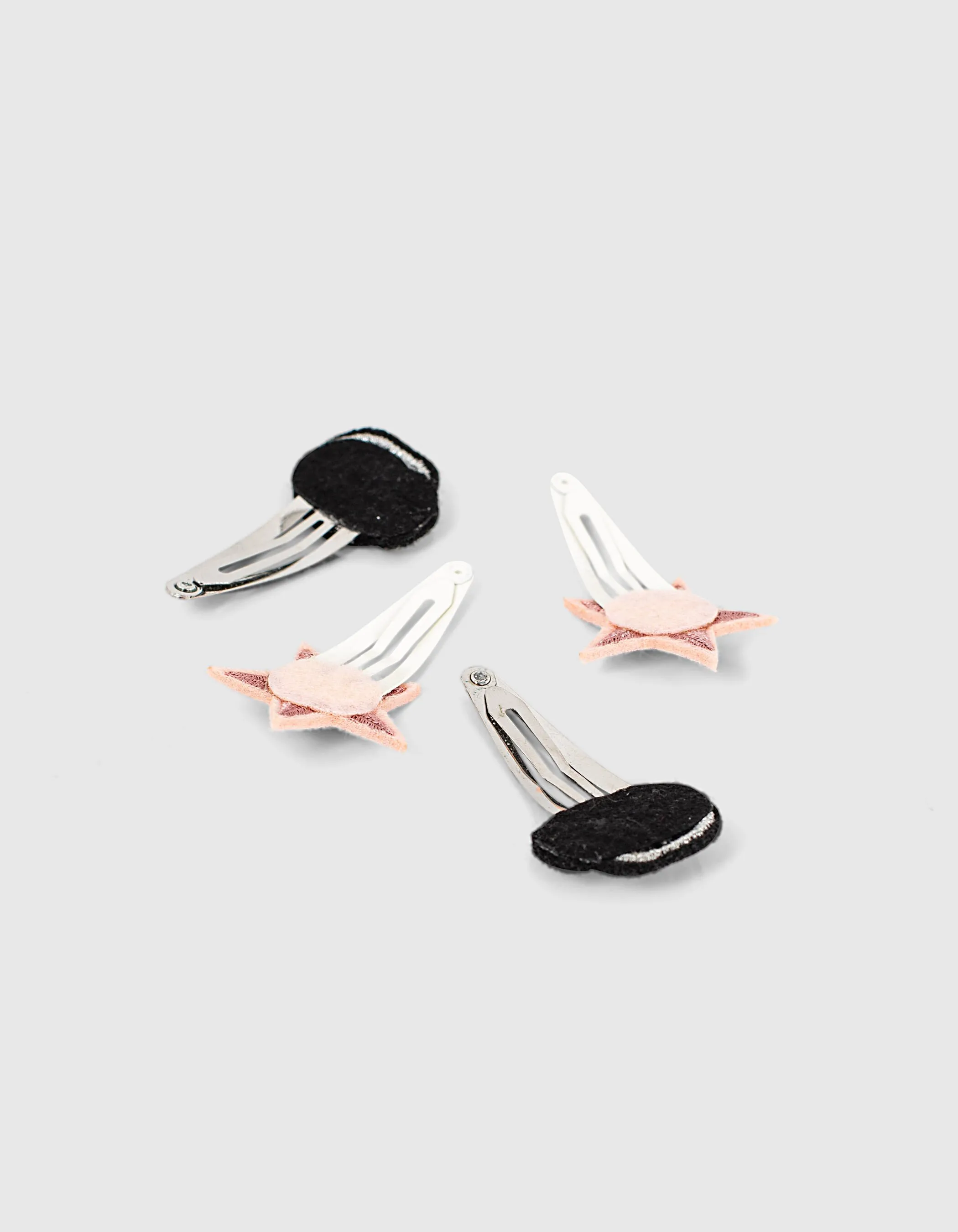 Barrettes dusty rose à étoiles et grises à skulls fille